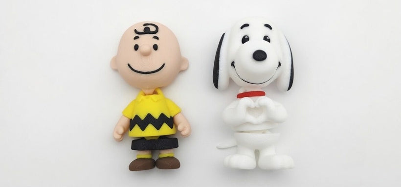 Articulated Snoopy Minifigure Collectible Keychain.