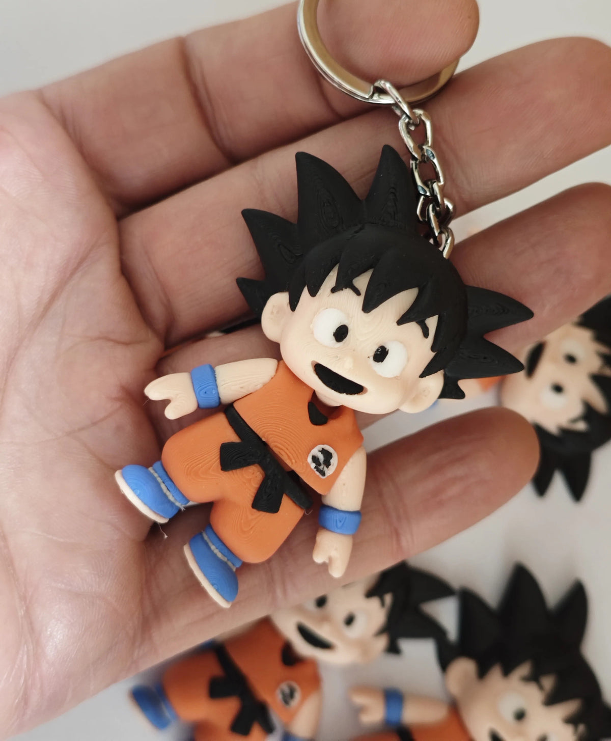 Articulated Goku Minifigure Collectible Keychain.