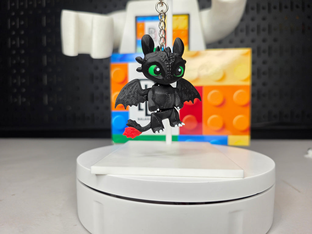 Articulated Night Fury Minifigure Collectible Keychain.