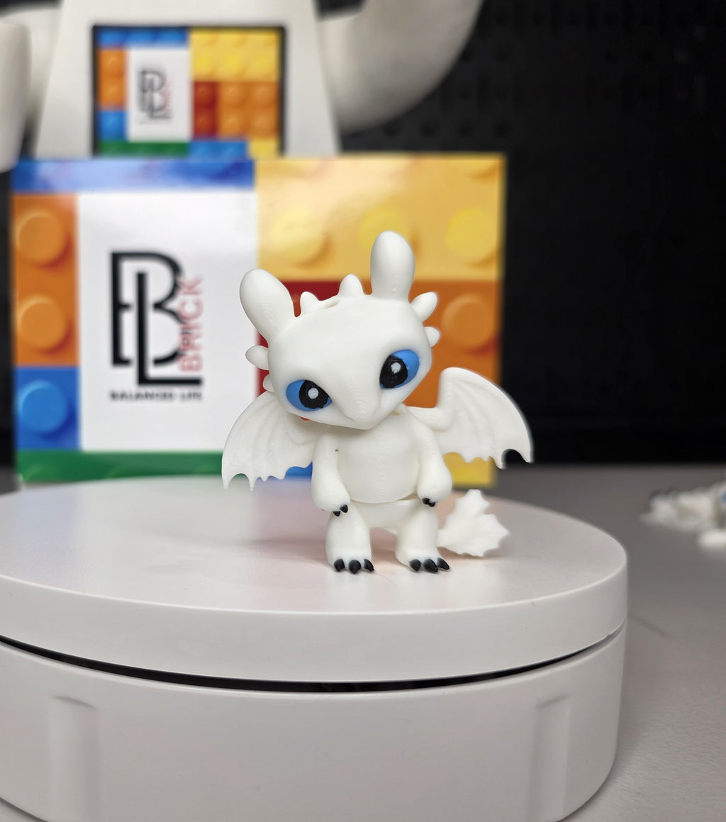Articulated Light Fury Minifigure Collectible Keychain.