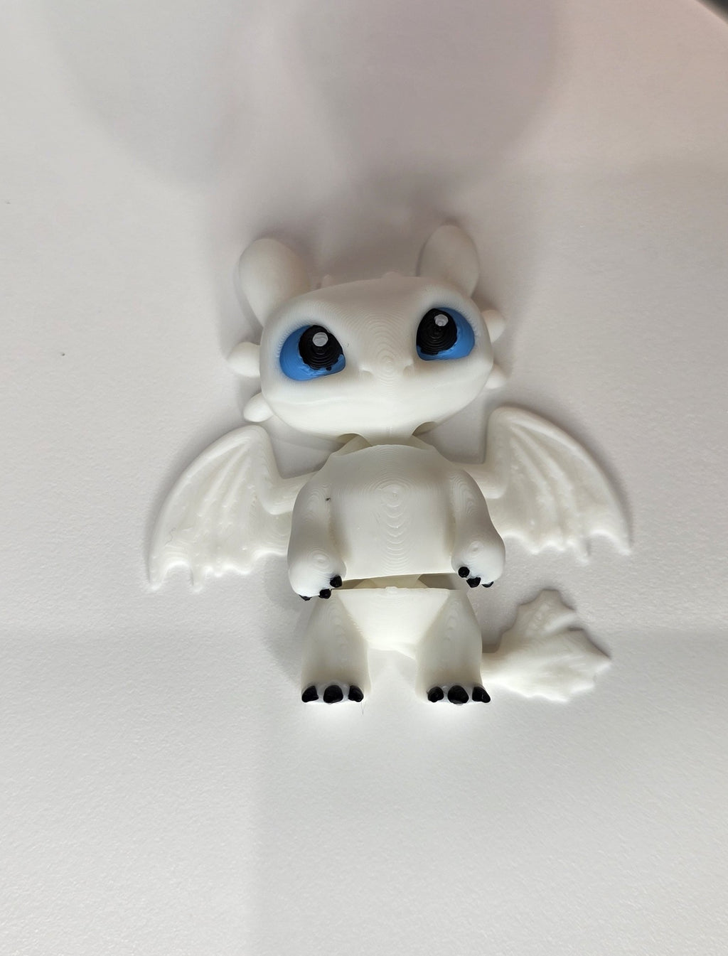 Articulated Light Fury Minifigure Collectible Keychain.