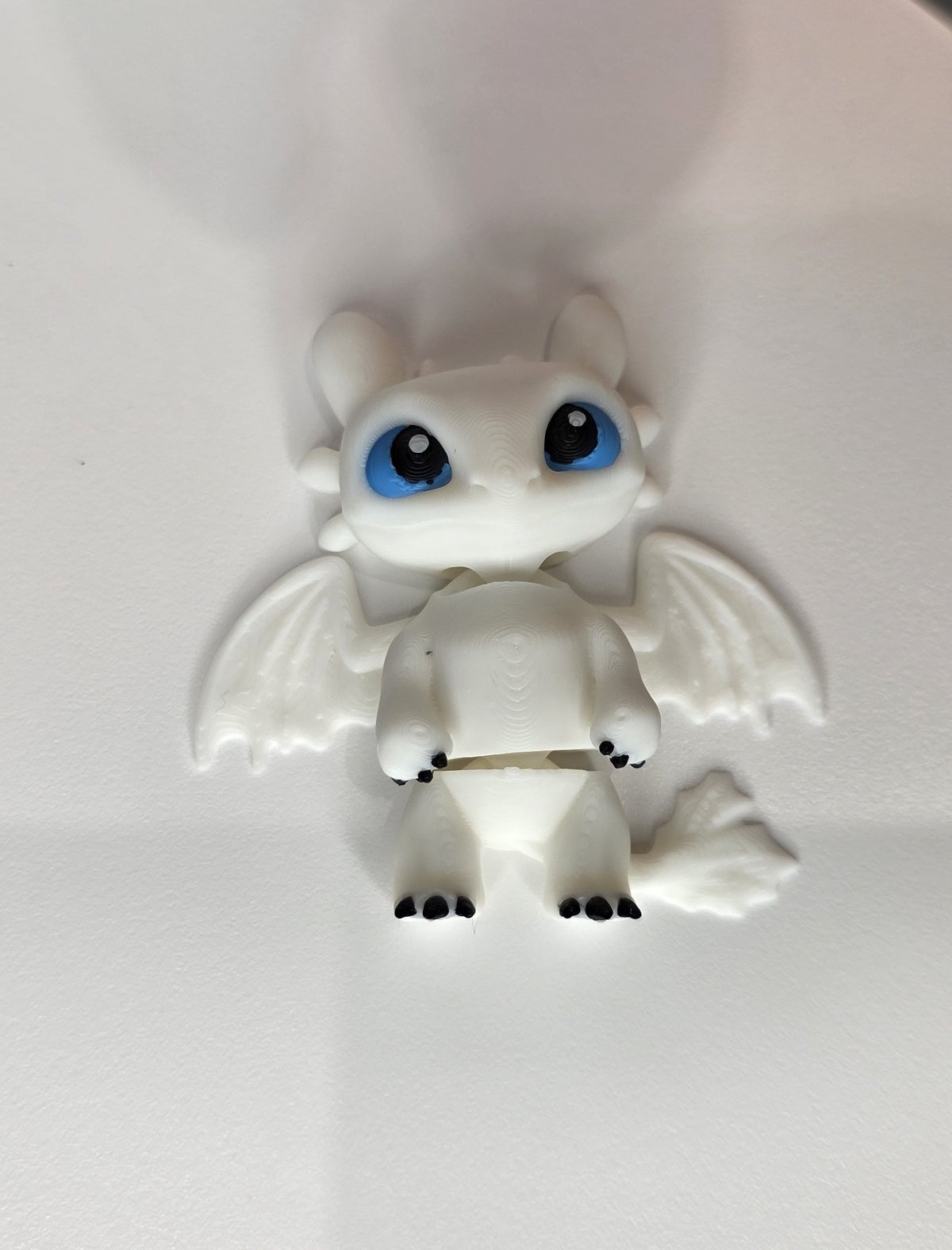 Articulated Light Fury Minifigure Collectible Keychain.