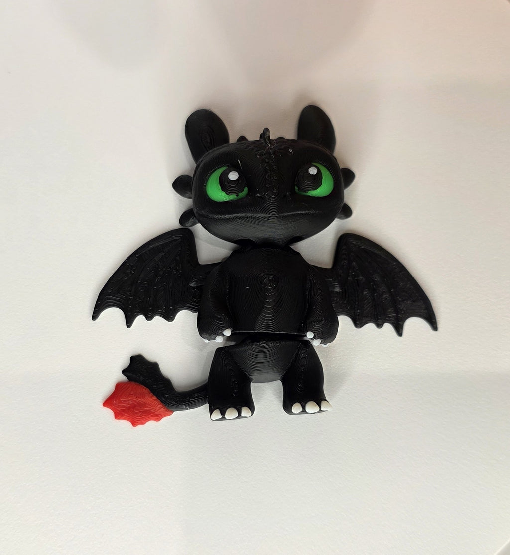 Articulated Night Fury Minifigure Collectible Keychain.