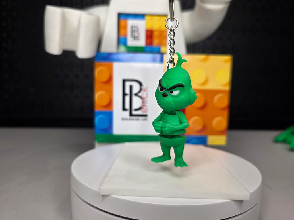 Articulated Grinch Minifigure Collectible Keychain.