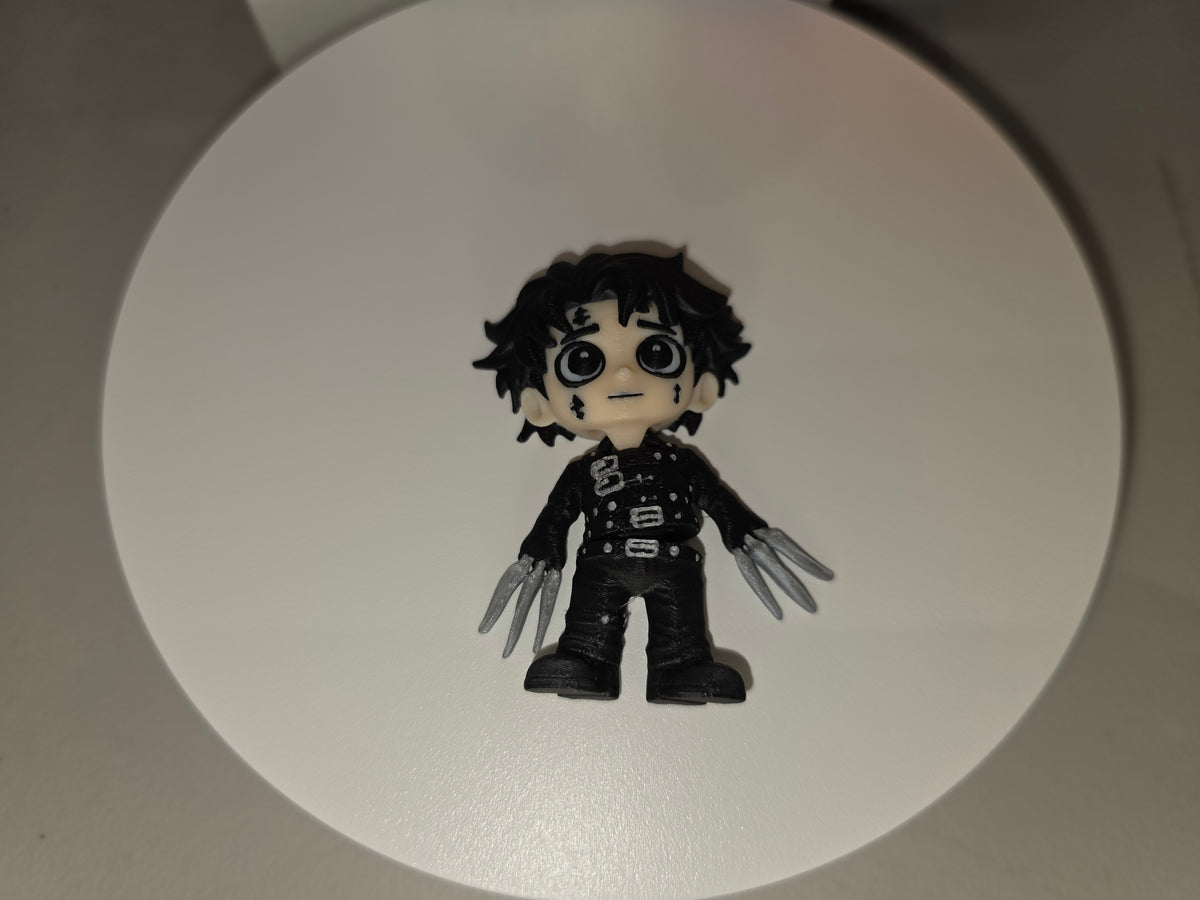 Articulated Edward Scissorhands Minifigure Collectible Keychain.