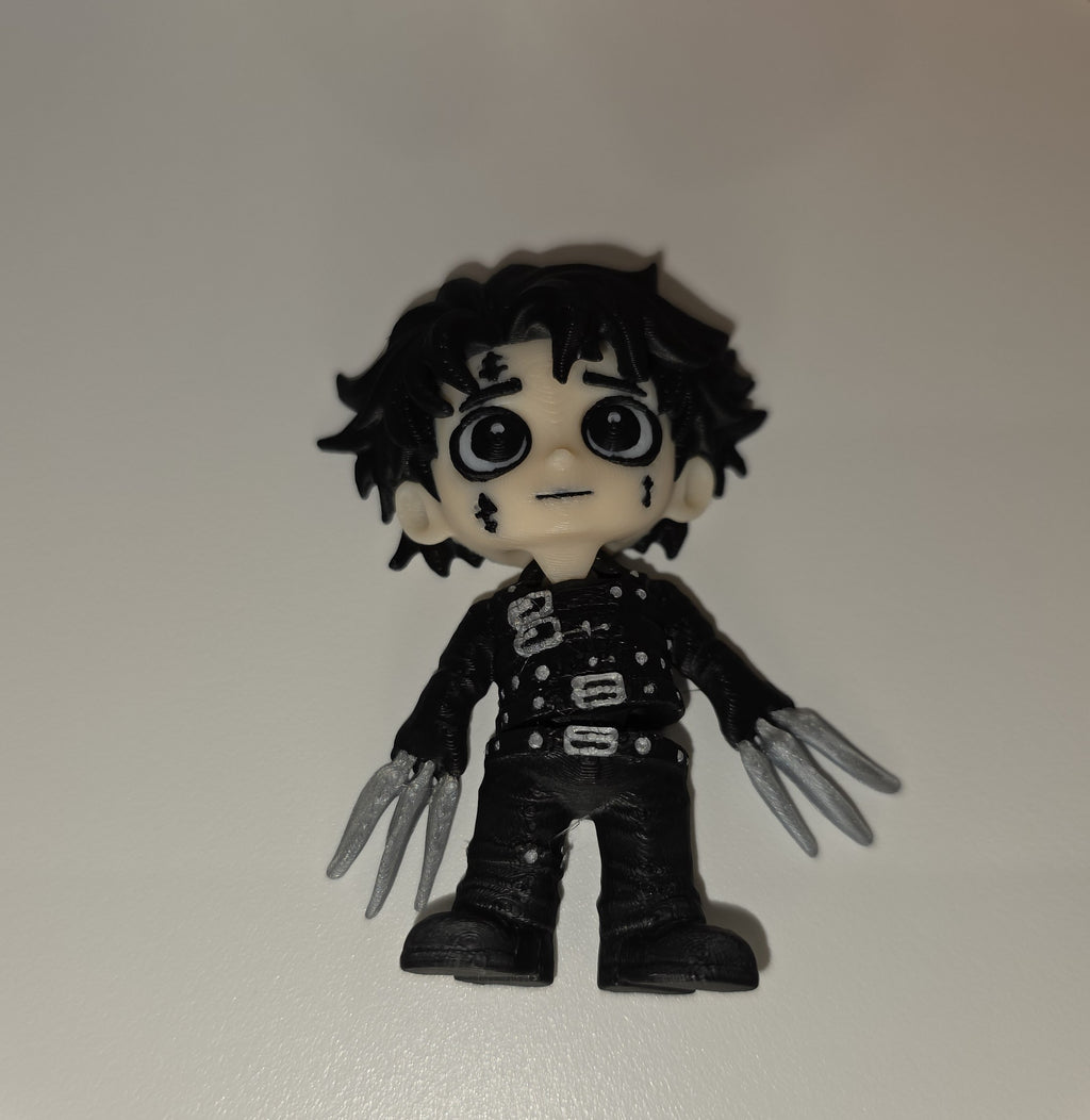 Articulated Edward Scissorhands Minifigure Collectible Keychain.