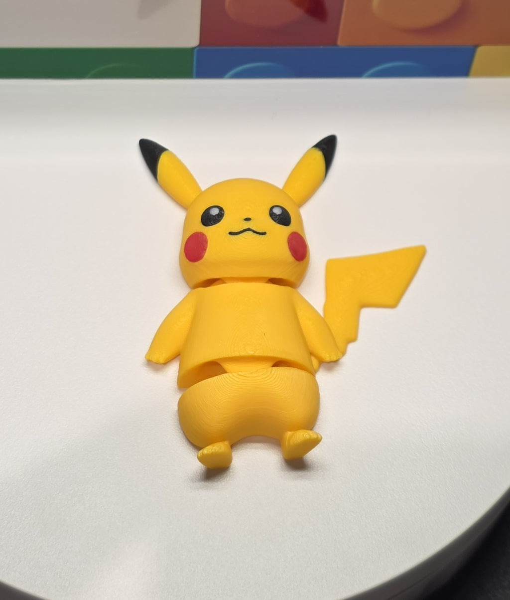 Articulated Pikachu Minifigure Collectible Keychain.