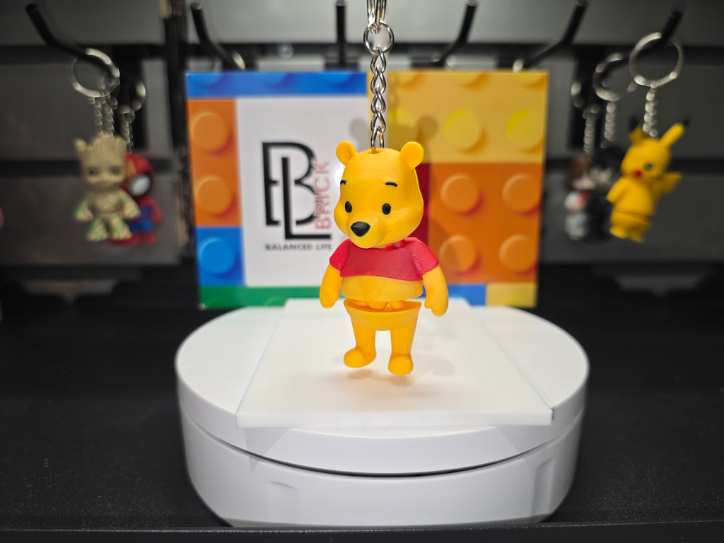 Articulated Winnie The Pooh Minifigure Collectible Keychain.