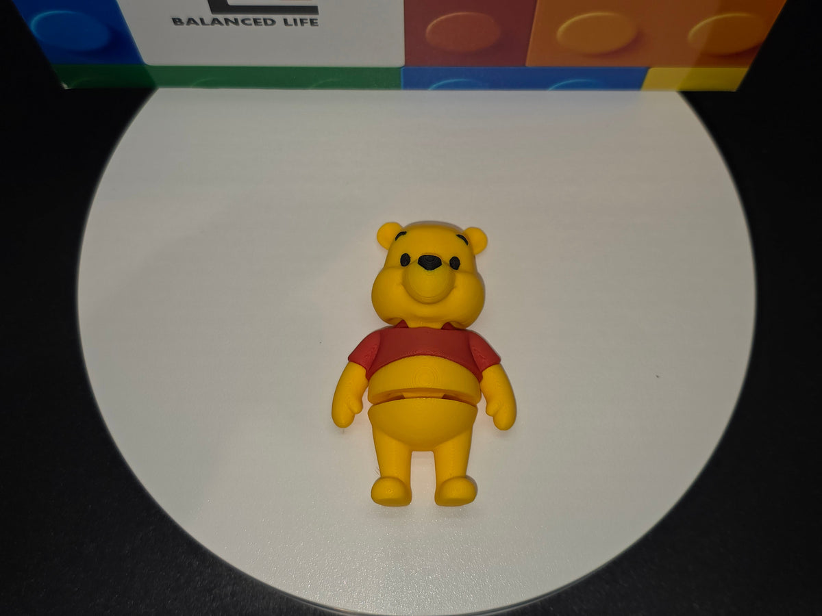 Articulated Winnie The Pooh Minifigure Collectible Keychain.