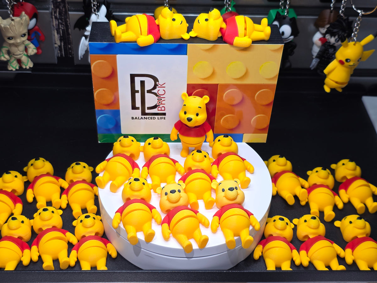 Articulated Winnie The Pooh Minifigure Collectible Keychain.