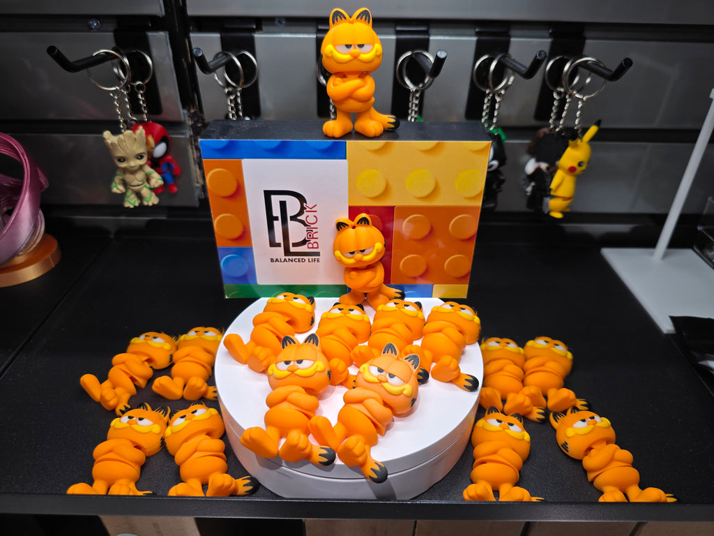 Articulated Garfield Minifigure Collectible Keychain.