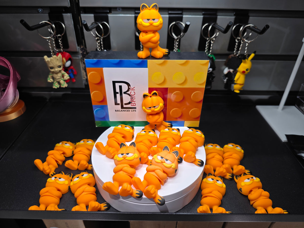 Articulated Garfield Minifigure Collectible Keychain.
