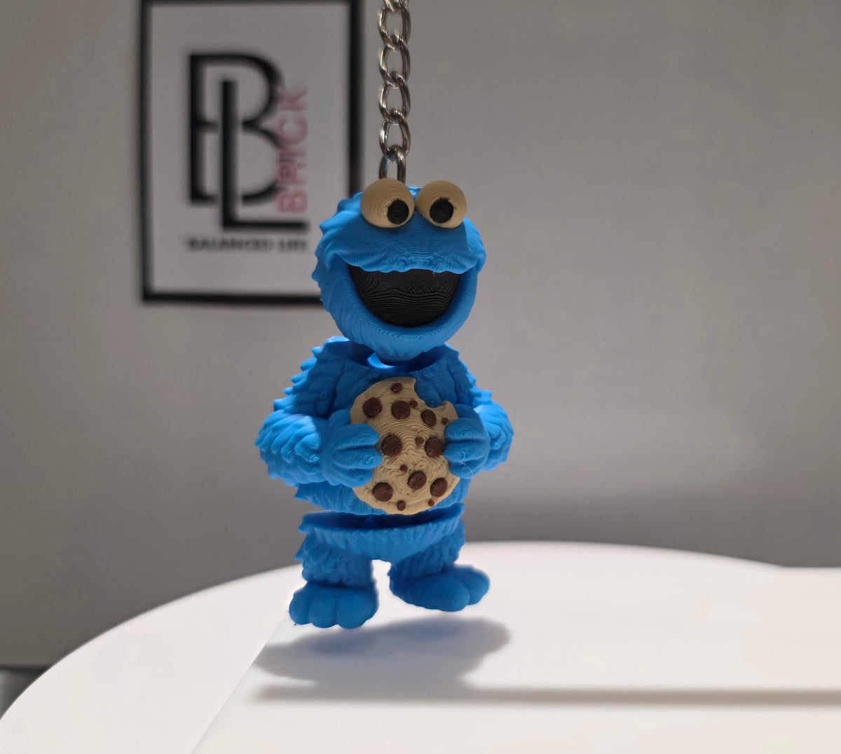 Articulated Cooky Monster Minifigure Collectible Keychain.