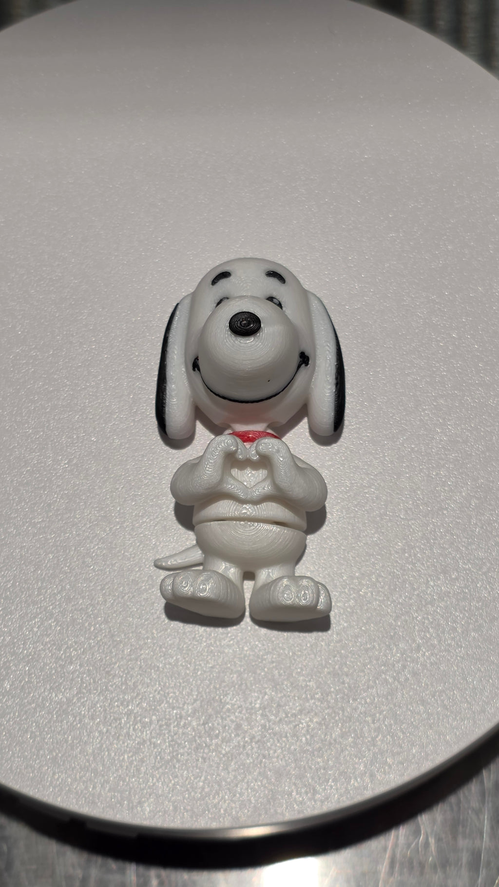 Articulated Snoopy Minifigure Collectible Keychain.