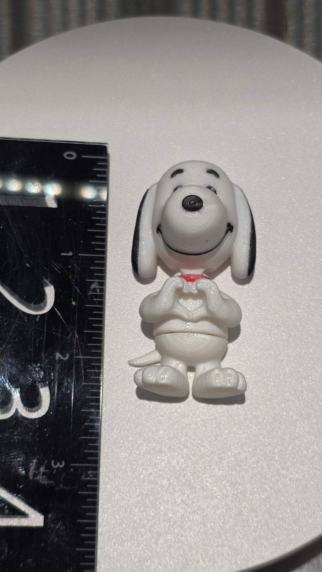 Articulated Snoopy Minifigure Collectible Keychain.