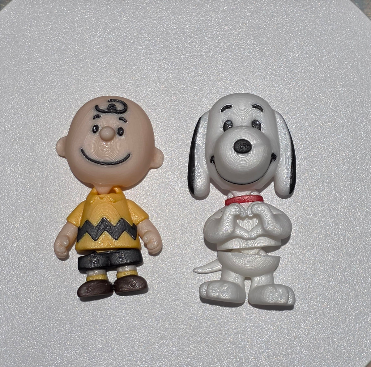 Articulated Charlie Brown Minifigure Collectible Keychain.