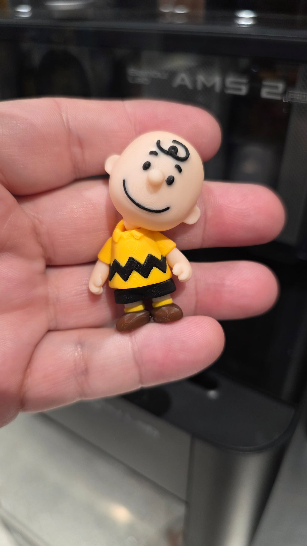 Articulated Charlie Brown Minifigure Collectible Keychain.