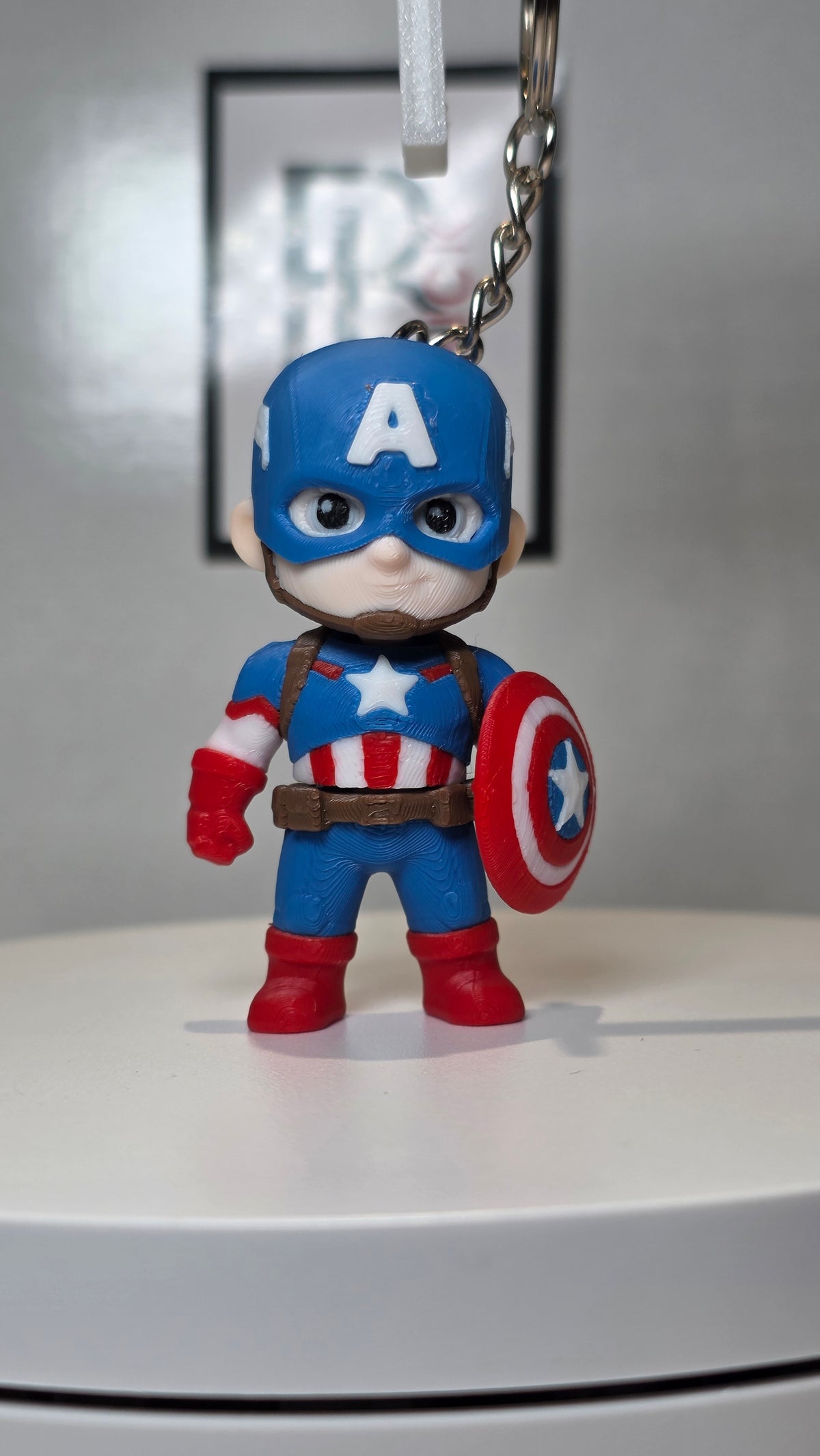Articulated Capitan America Minifigure Collectible Keychain.