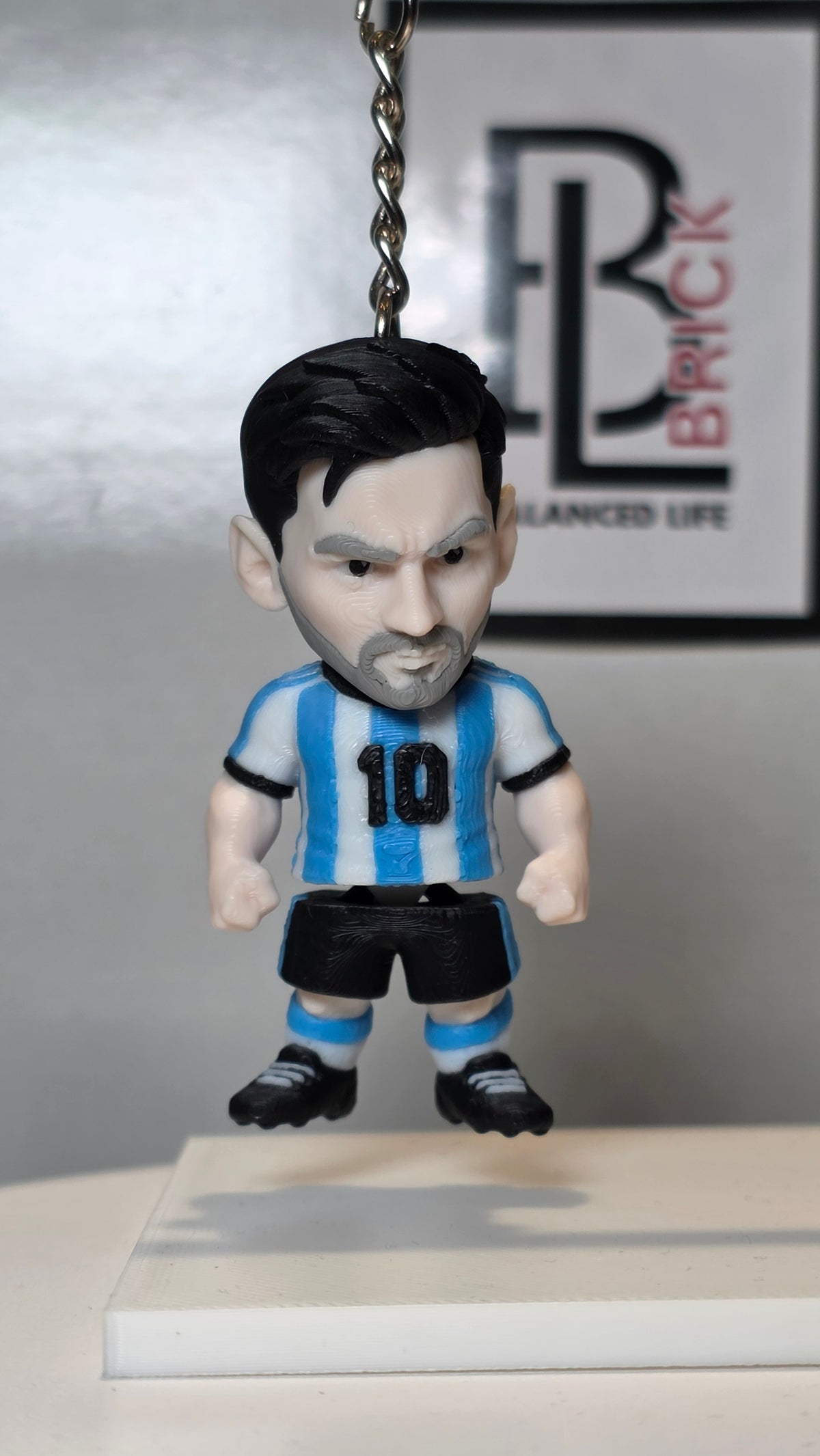 Articulated Messi Minifigure Collectible Keychain.