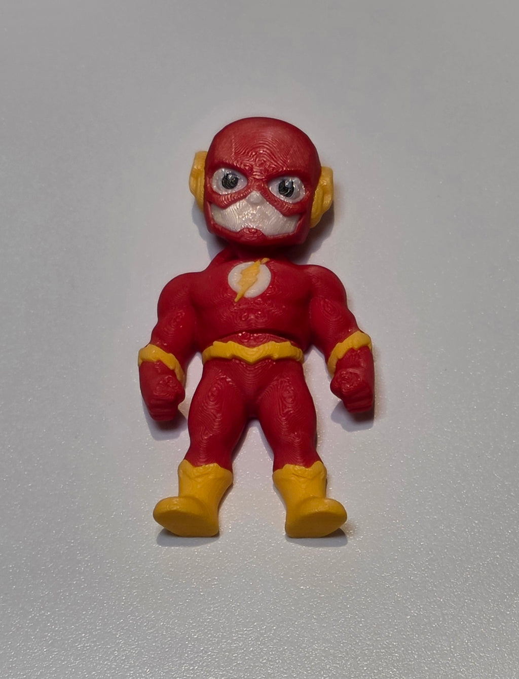 Articulated Flash Minifigure Collectible Keychain.