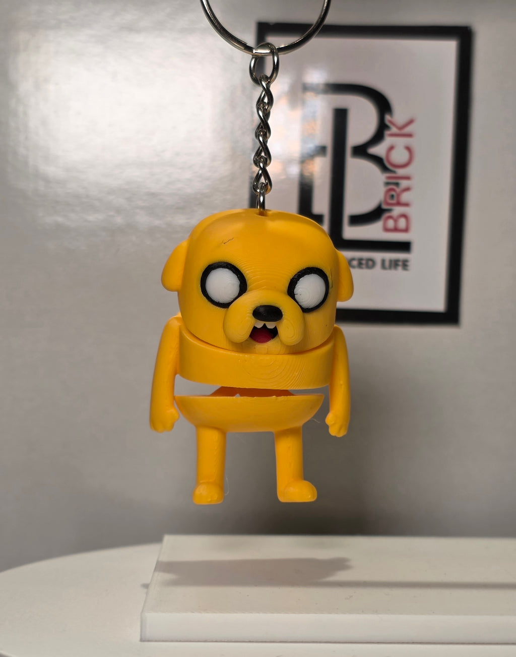 Articulated Jake Minifigure Collectible Keychain.