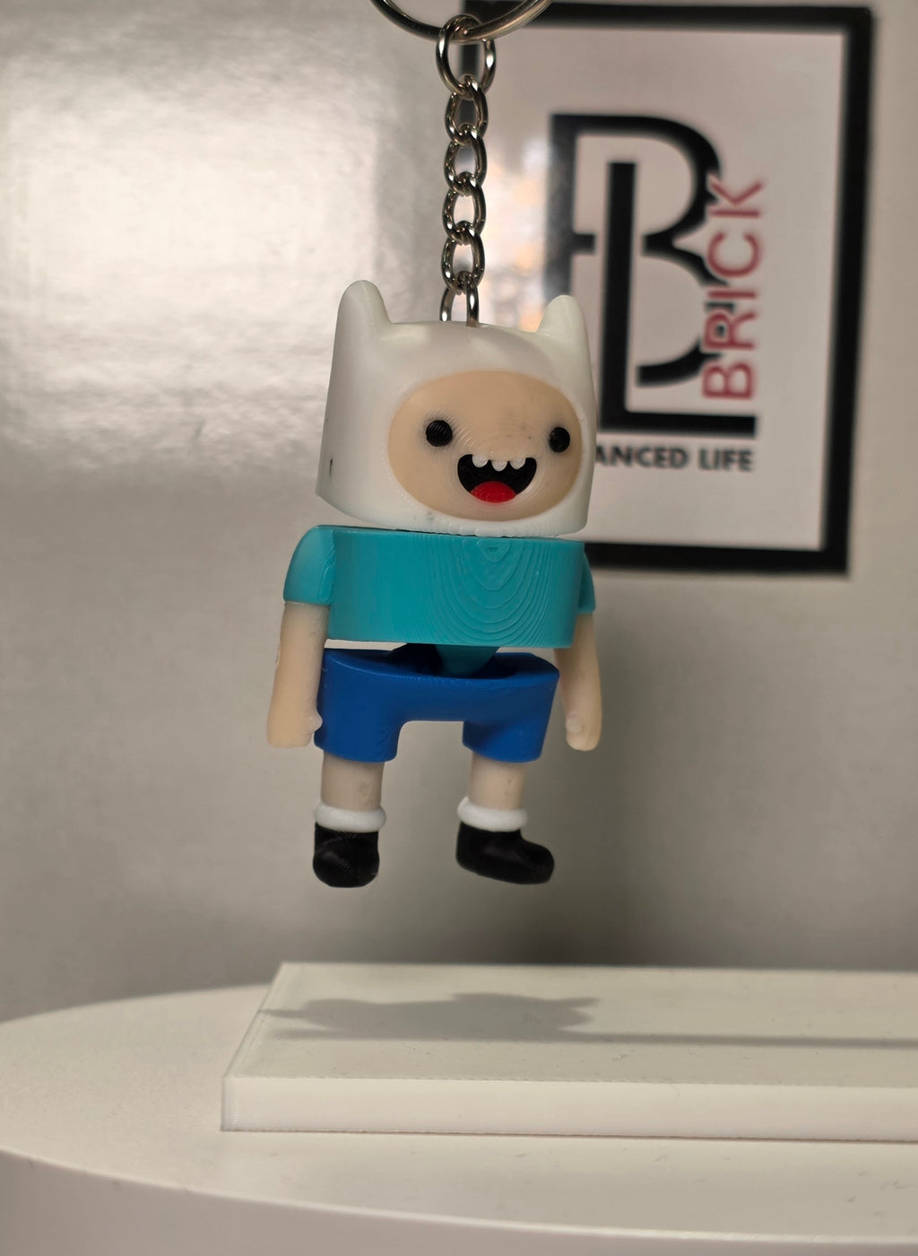 Articulated Finn Minifigure Collectible Keychain.