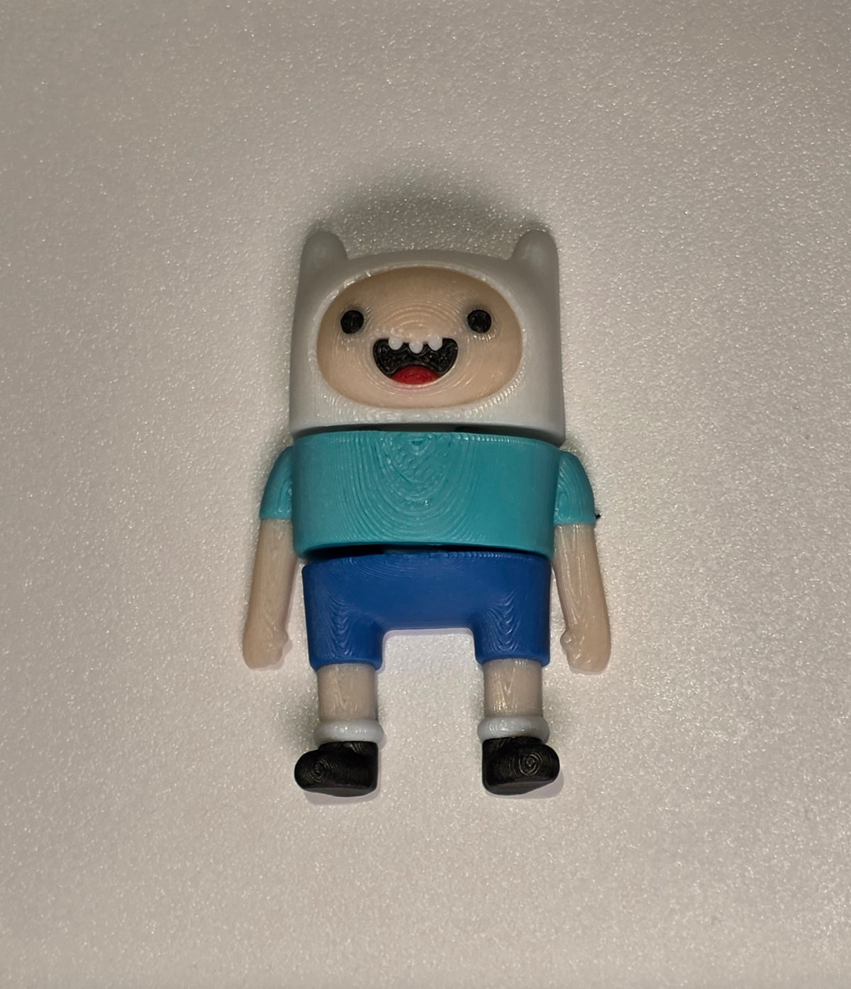 Articulated Finn Minifigure Collectible Keychain.