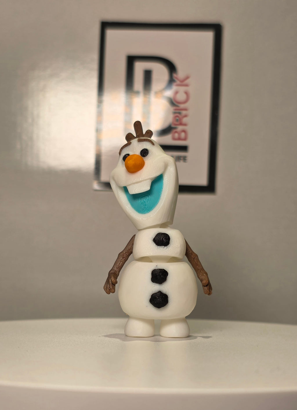 Articulated Olaf Bell Minifigure Collectible Keychain.