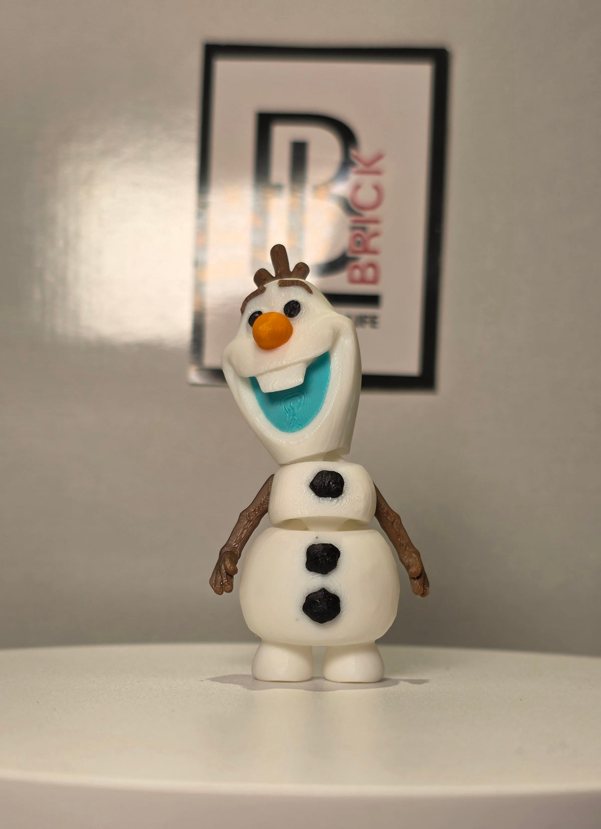 Articulated Olaf Bell Minifigure Collectible Keychain.