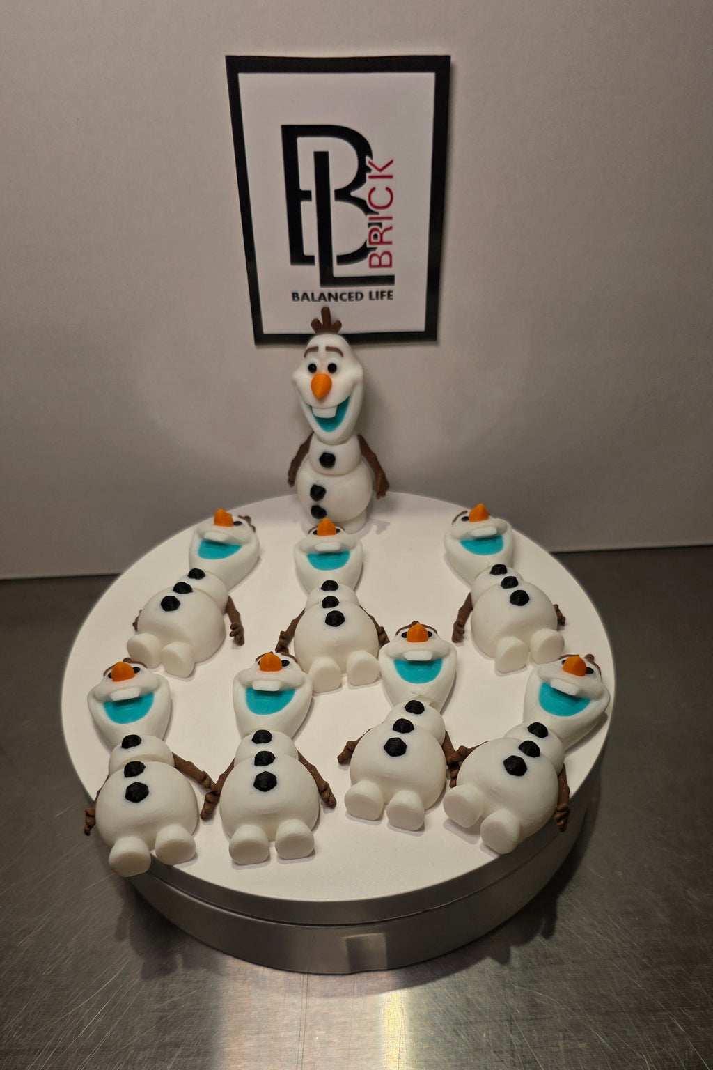 Articulated Olaf Bell Minifigure Collectible Keychain.