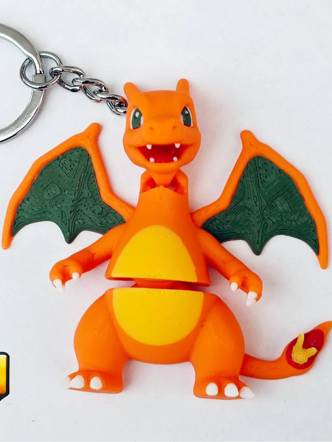 Articulated Charizard Minifigure Collectible Keychain.