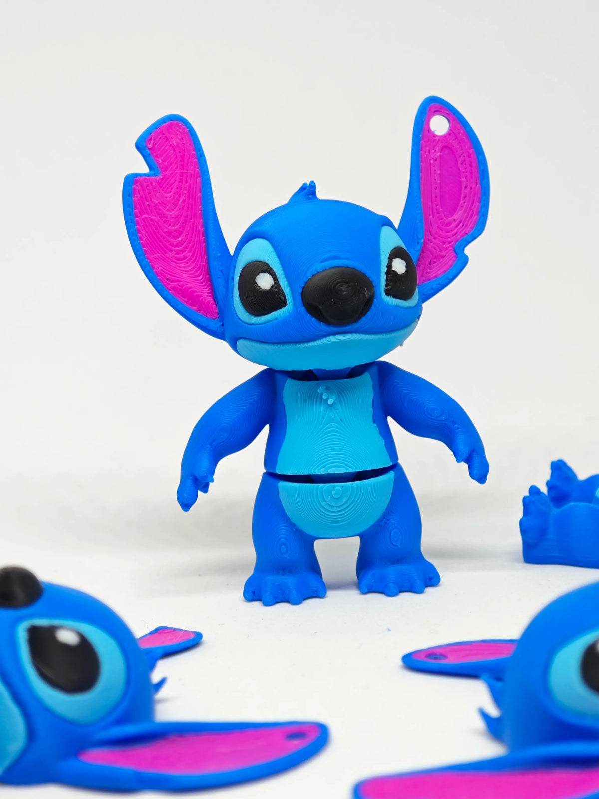 Articulated Stitch Minifigure Collectible Keychain.