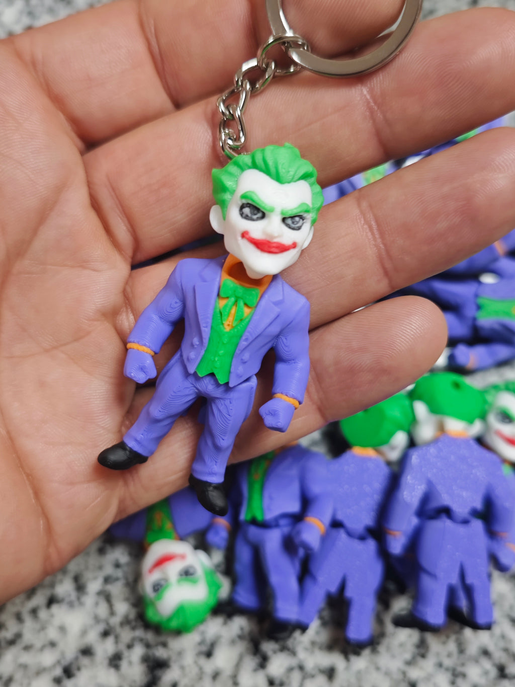 Articulated Joker Minifigure Collectible Keychain.