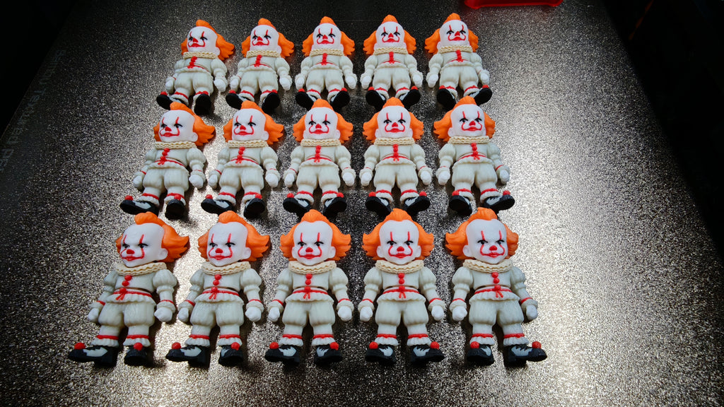 Articulated Pennywise Minifigure Collectible Keychain.