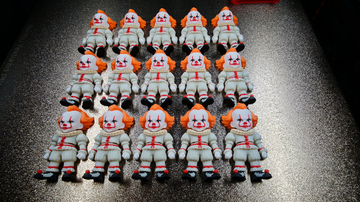 Articulated Pennywise Minifigure Collectible Keychain.