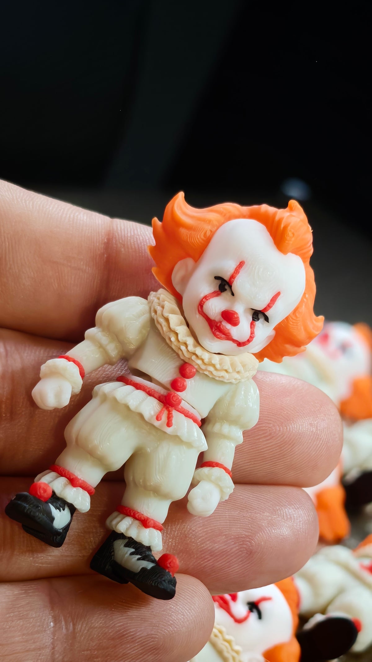 Articulated Pennywise Minifigure Collectible Keychain.