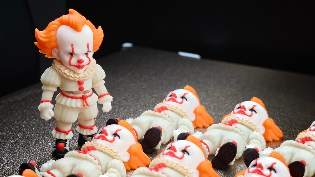 Articulated Pennywise Minifigure Collectible Keychain.