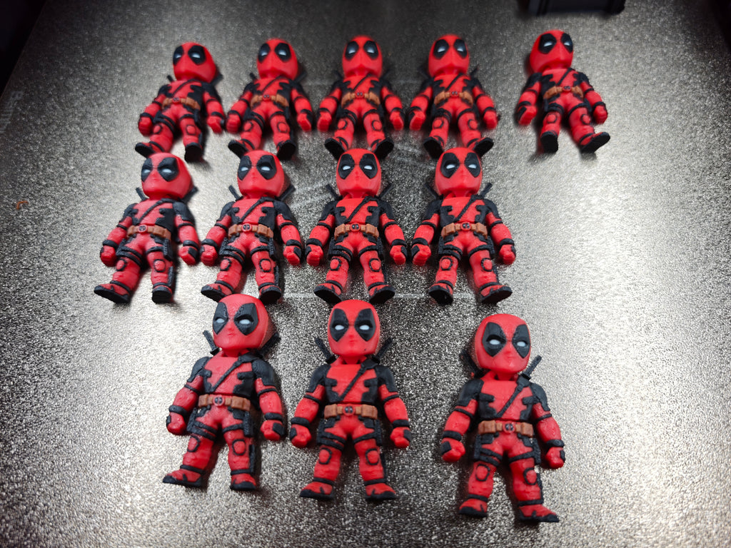 Articulated Deadpool Minifigure Collectible Keychain.
