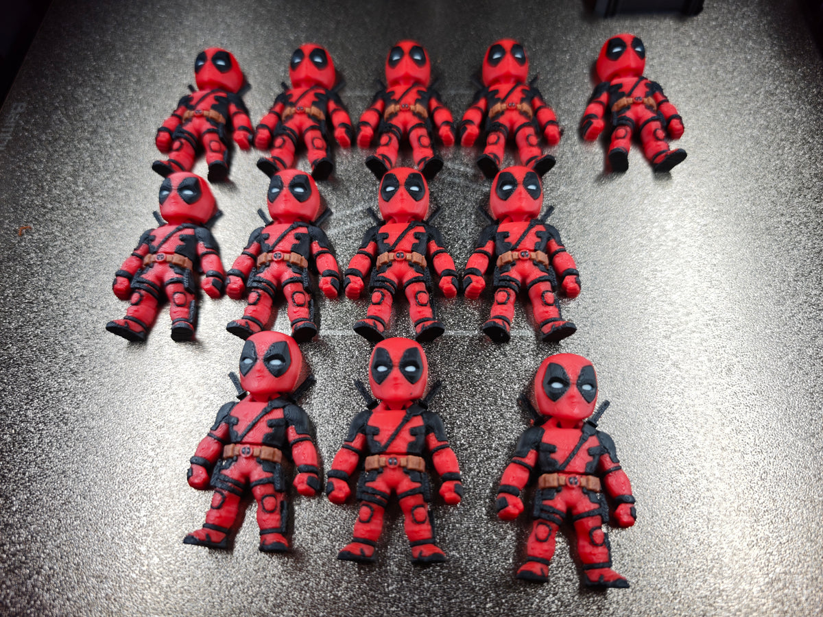Articulated Deadpool Minifigure Collectible Keychain.