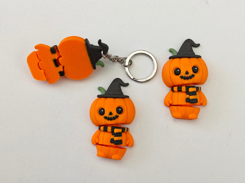 Articulated Halloween Pumpkin Minifigure Collectible Keychain.