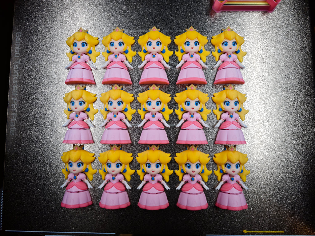 Articulated Princess Peach Minifigure Collectible Keychain.