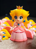 Articulated Princess Peach Minifigure Collectible Keychain.
