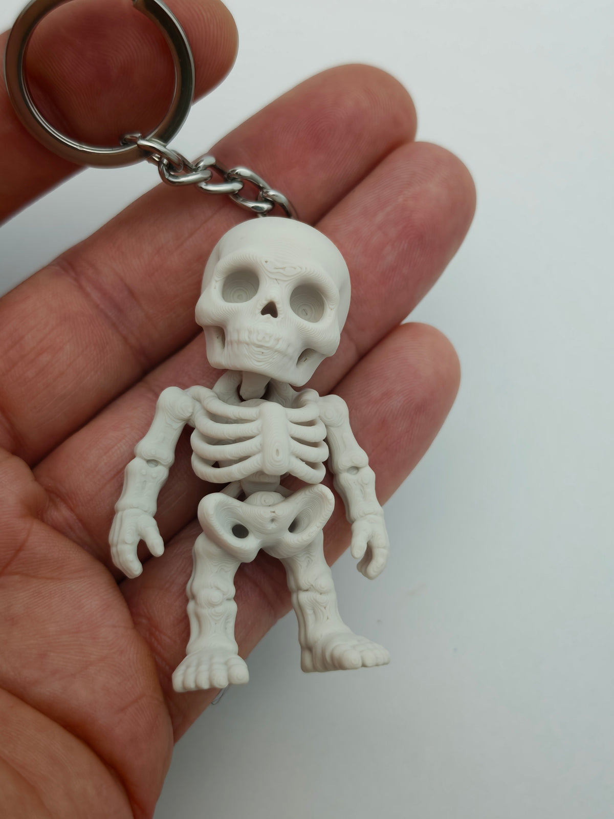 Articulated Skeleton Minifigure Collectible Keychain.