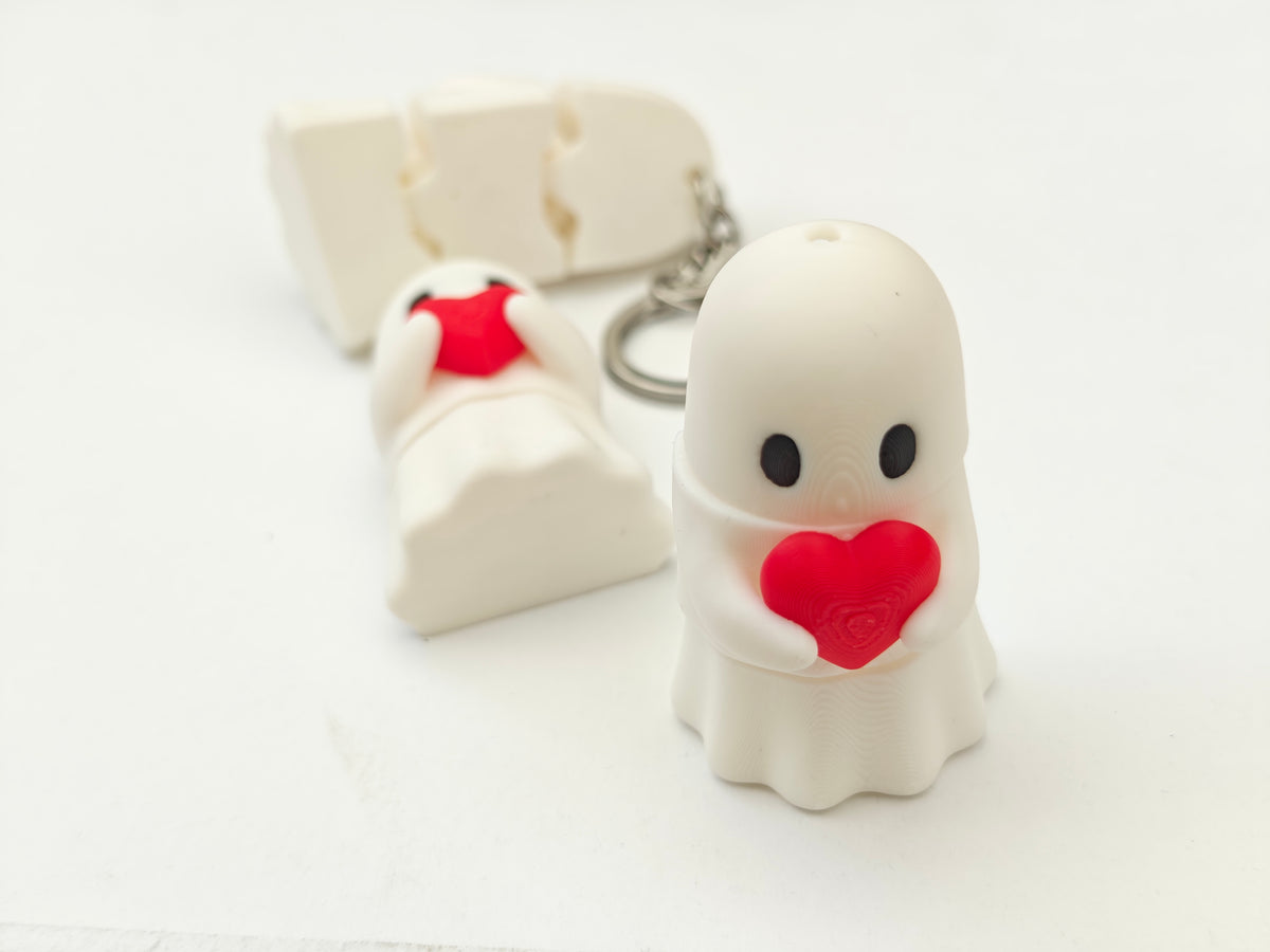 Articulated Ghost with a Heart Minifigure Collectible Keychain.