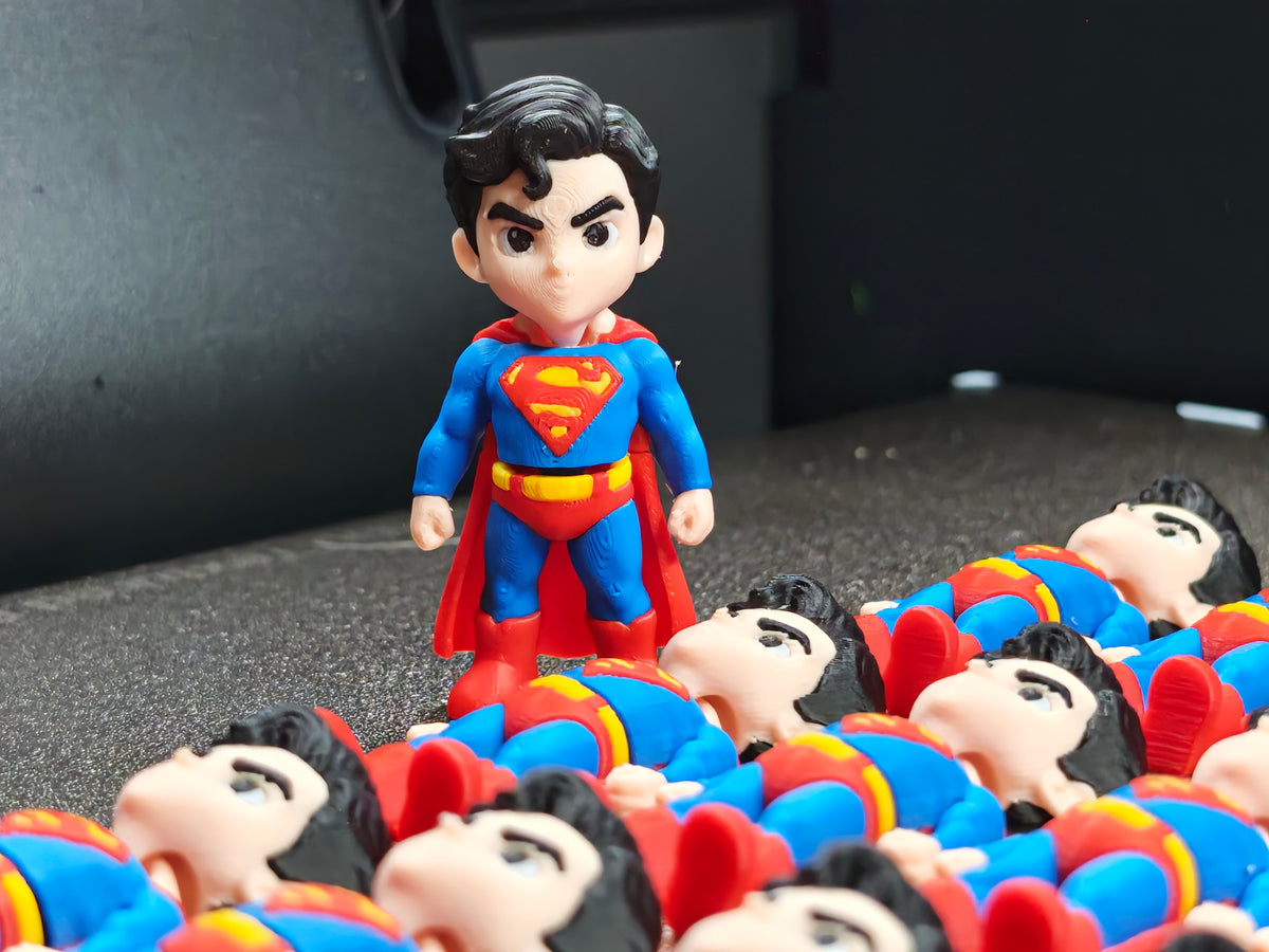 Articulated Superman Minifigure Collectible Keychain.