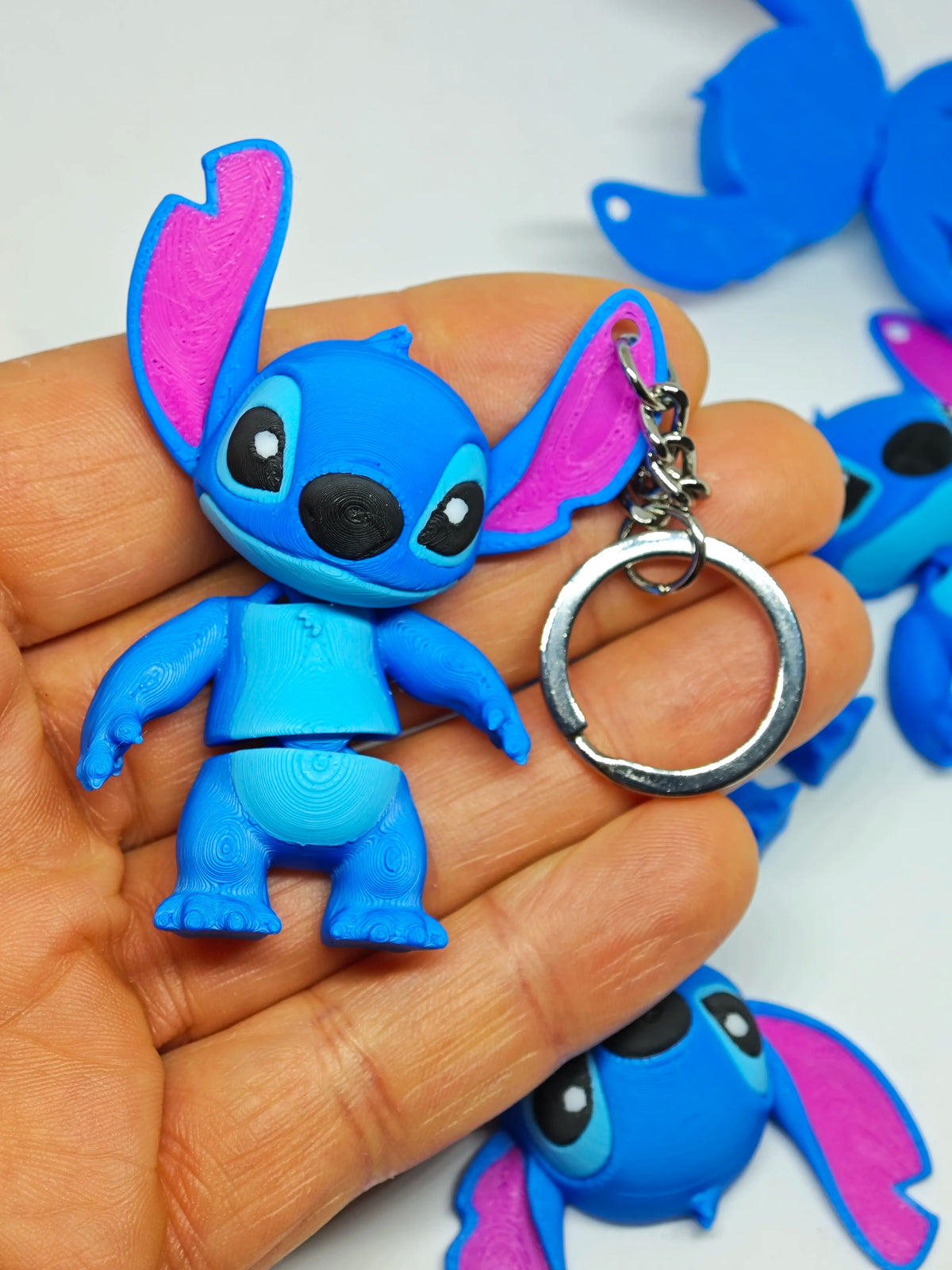 Articulated Stitch Minifigure Collectible Keychain.