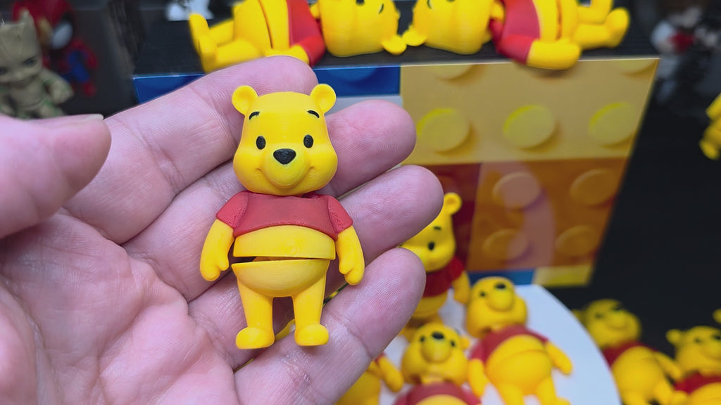 Articulated Winnie The Pooh Minifigure Collectible Keychain.