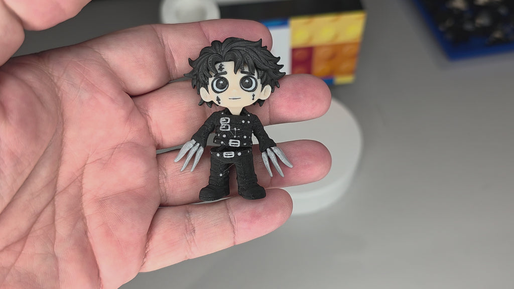 Articulated Edward Scissorhands Minifigure Collectible Keychain.