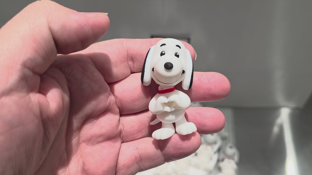 Articulated Snoopy Minifigure Collectible Keychain.