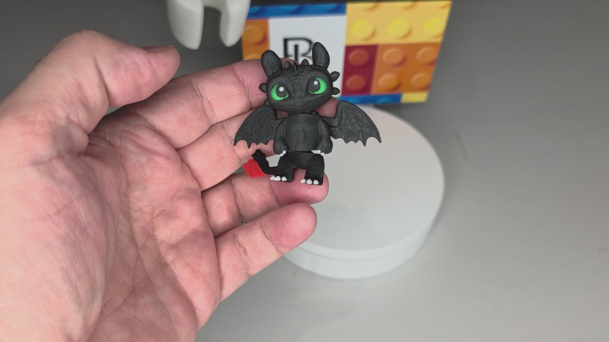 Articulated Night Fury Minifigure Collectible Keychain.